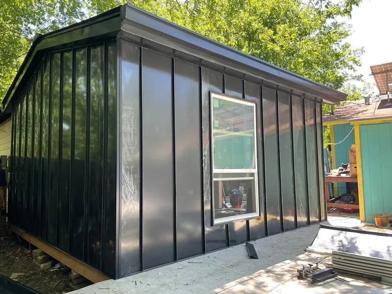 Black standing seam metal wall panels for Metal Roof Installation in Stonington