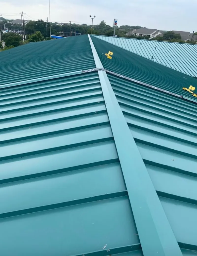 Green commercial metal roof ridge and valley for Metal Roof Repair in Stonington