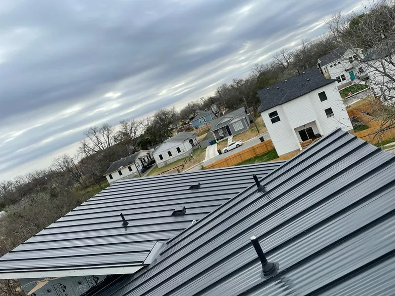 Standing seam metal roof panels with vents for Skylight Repair in Stonington